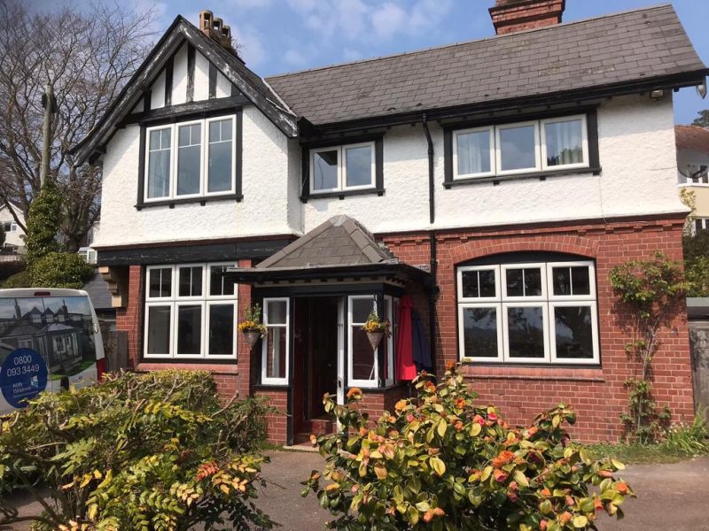 black foiled outer white sash windows
